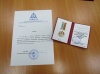 Наградили медалью за помощь епархии.